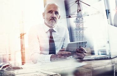 man with ipad thinking